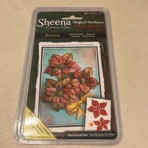 Sheena poinsettia festive fancies. Metal fur set  brand new in bag